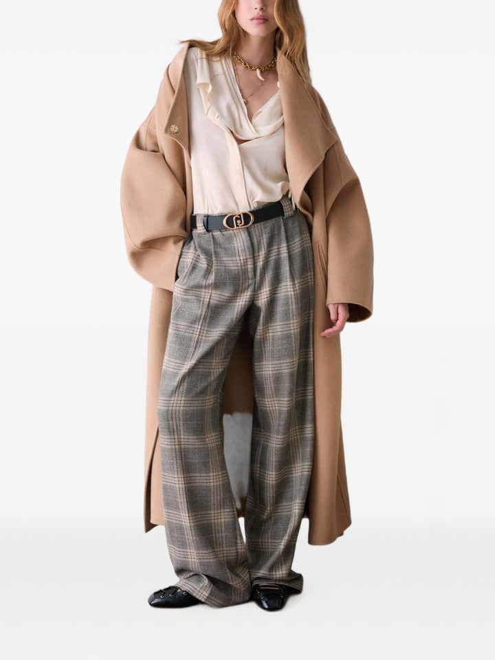 Pantaloni palazzo con cintuira di LIU JO. 