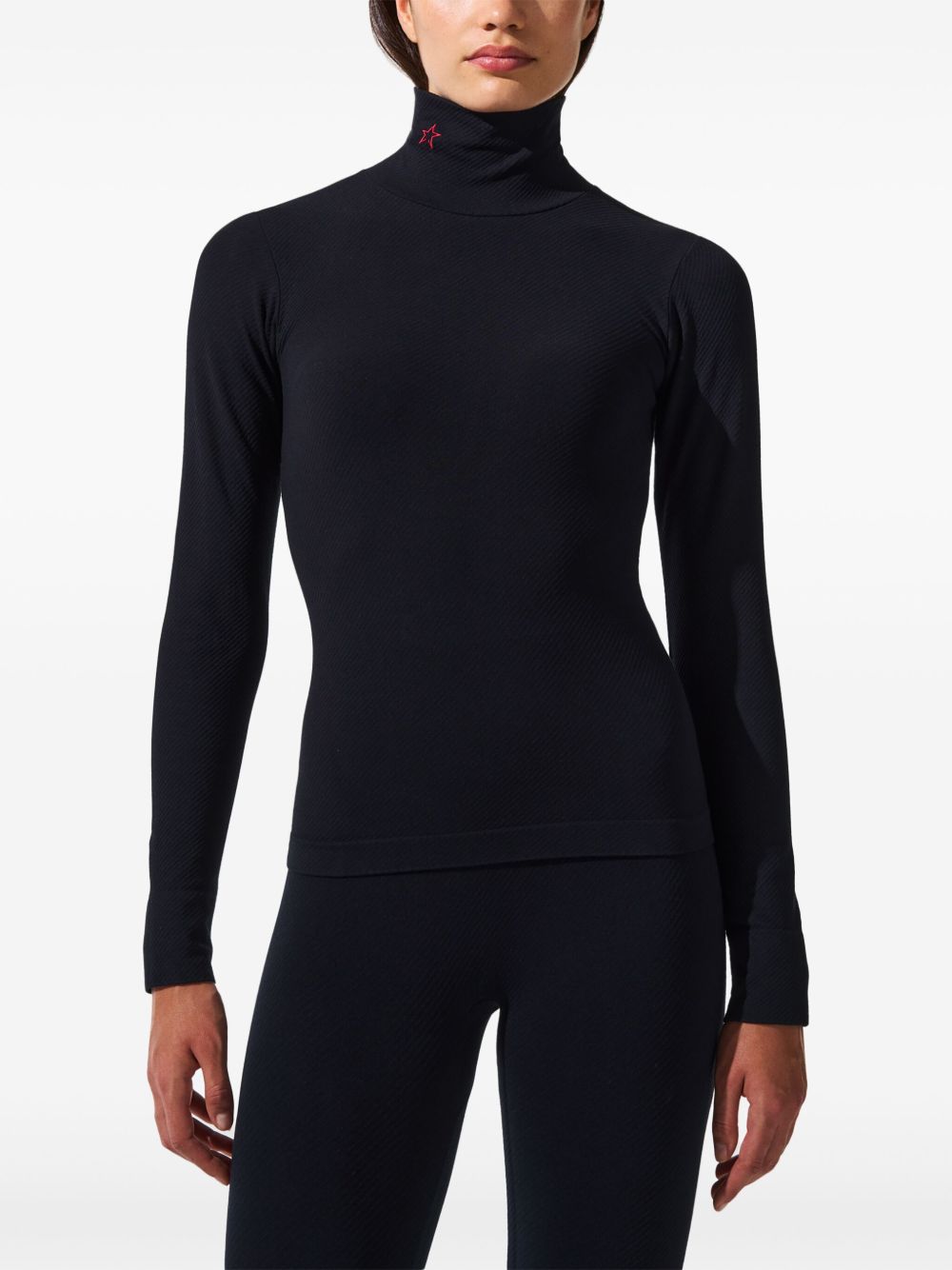Top con ricamo 
