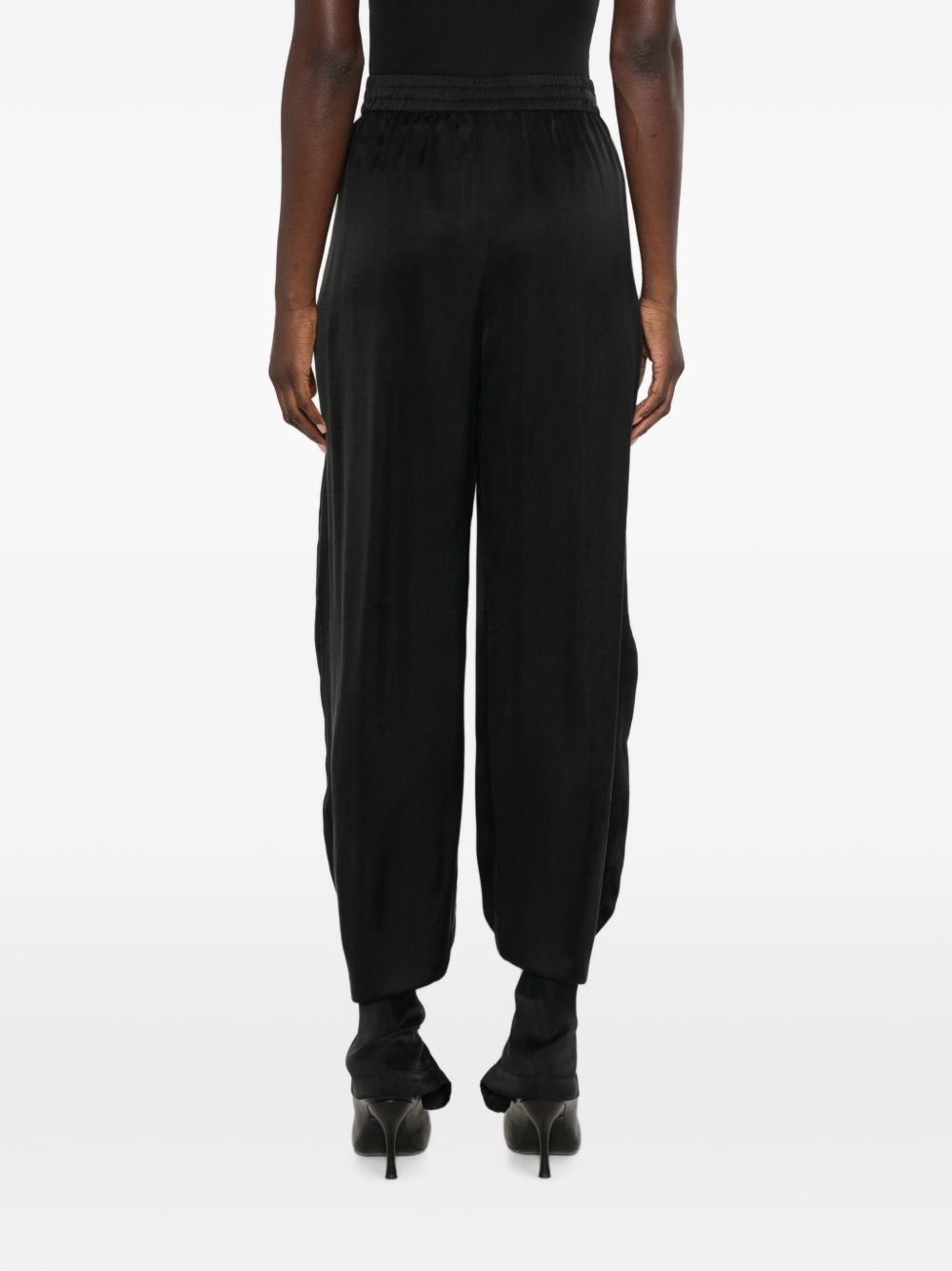 Pantaloni con pieghe 