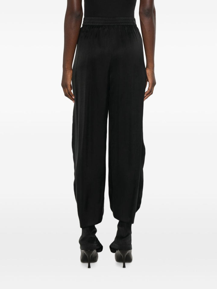 Pantaloni con pieghe 