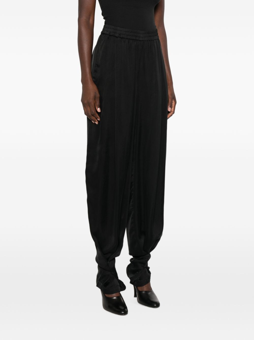 Pantaloni con pieghe 