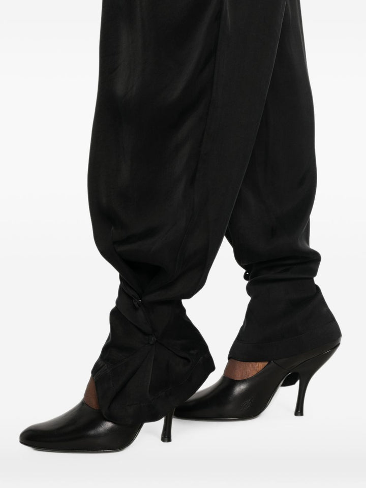 Pantaloni con pieghe 