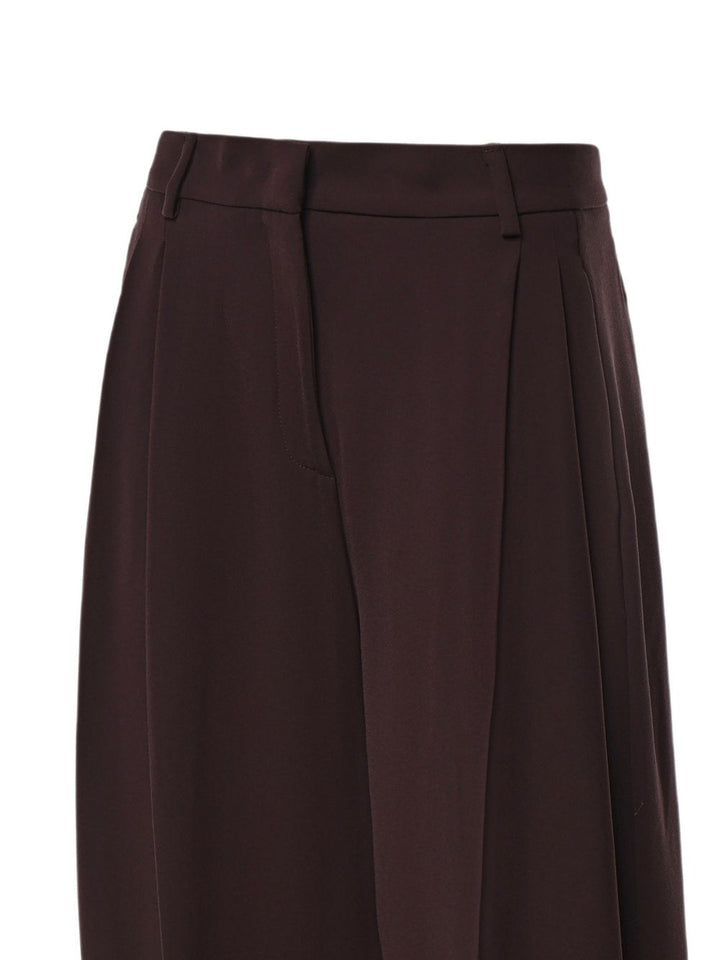 Pantaloni affusolati con pieghe 