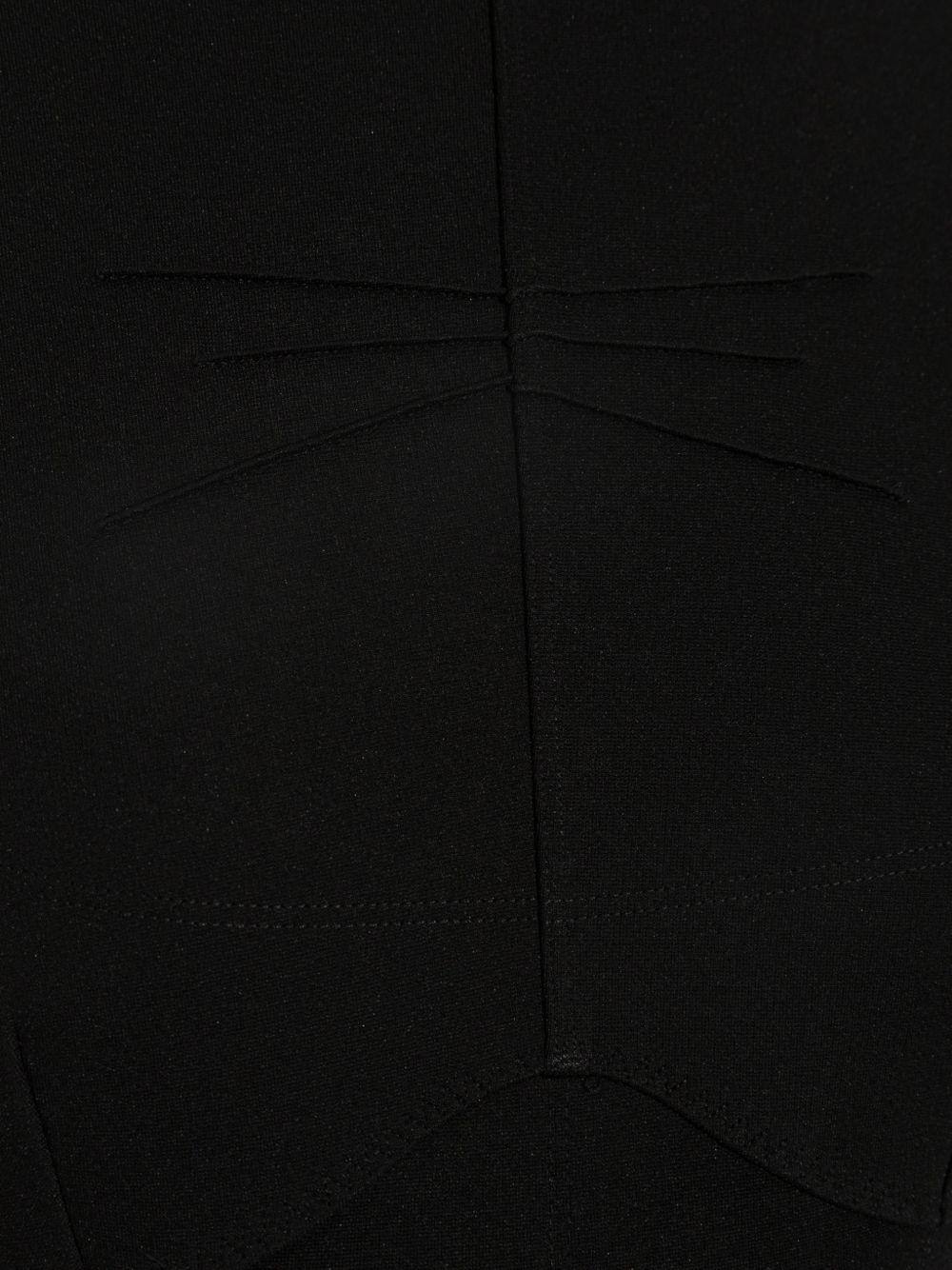 Top a maniche lunghe con inserti trasparenti 