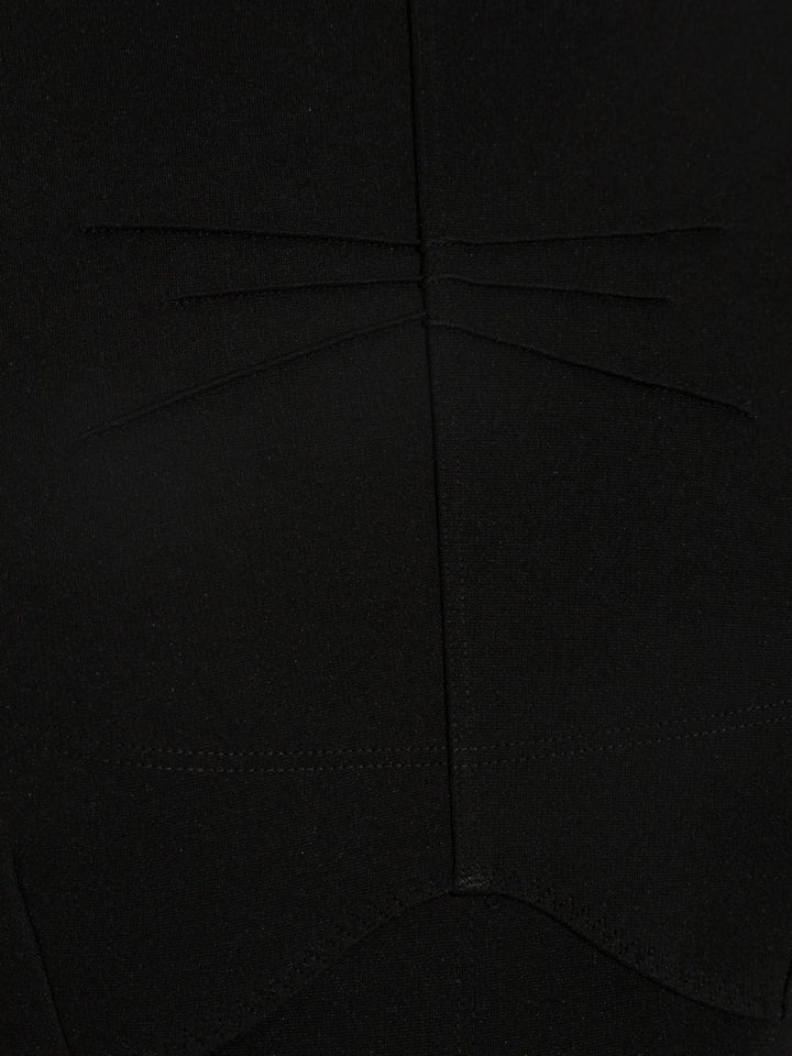 Top a maniche lunghe con inserti trasparenti 