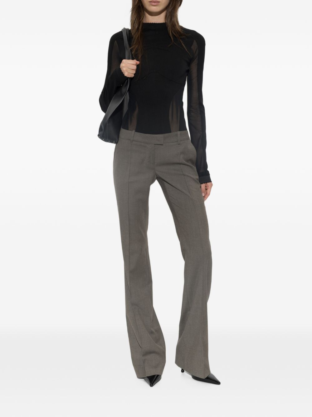 Top a maniche lunghe con inserti trasparenti 