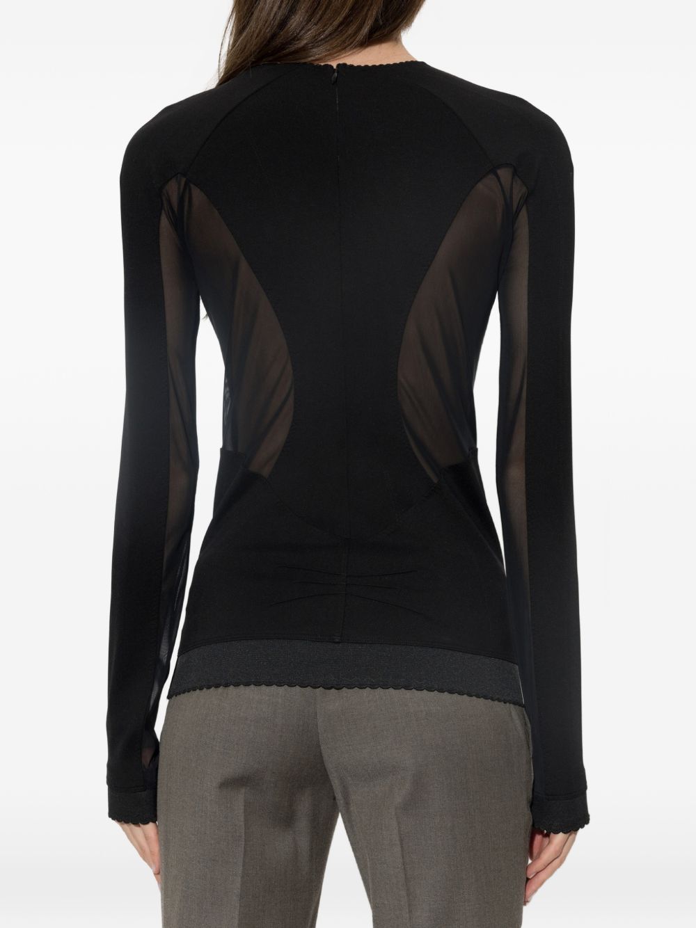 Top a maniche lunghe con inserti trasparenti 