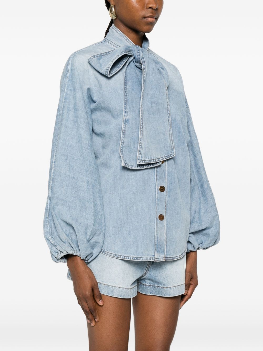 Blusa Indra con collo lavallière 