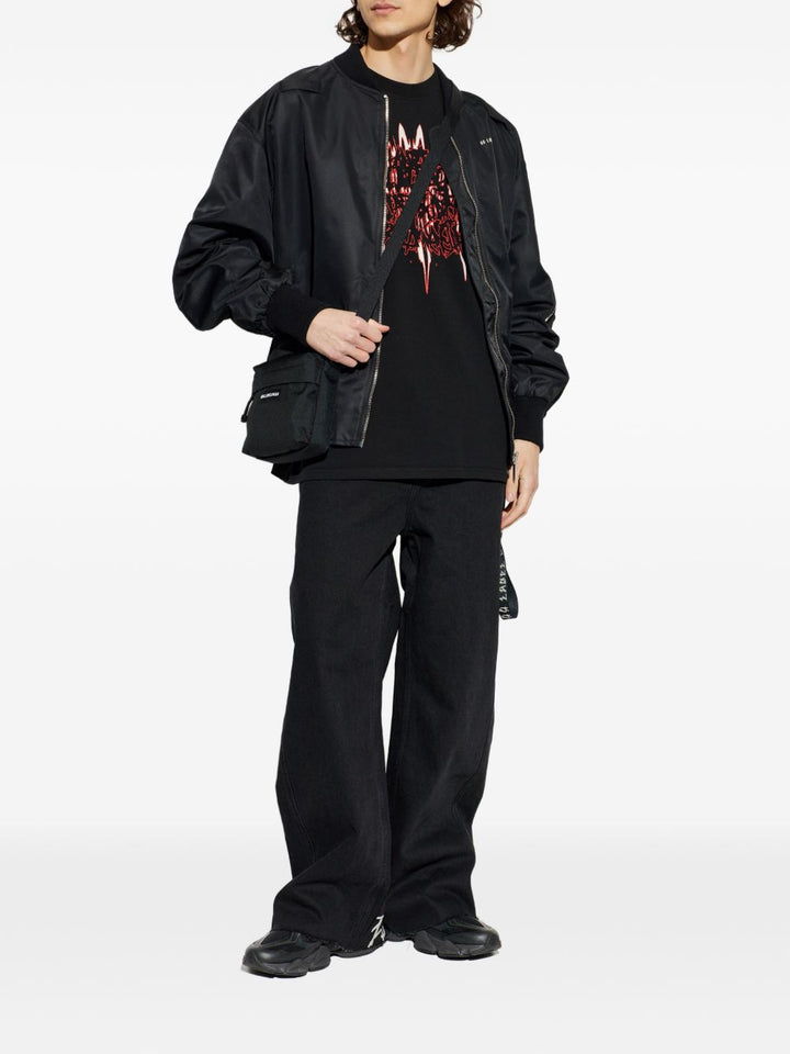 Pantaloni neri con logo 