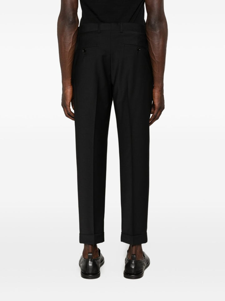 Pantaloni neri con risvolto 