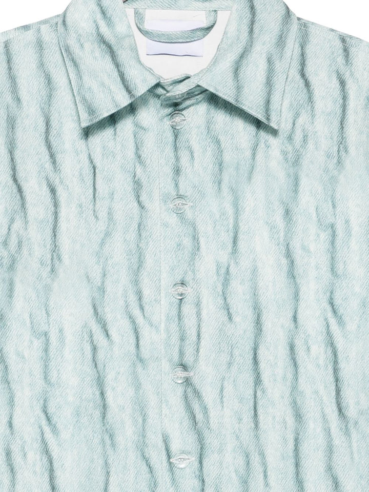 Camicia giacca azzurra con effetto stropicciato 