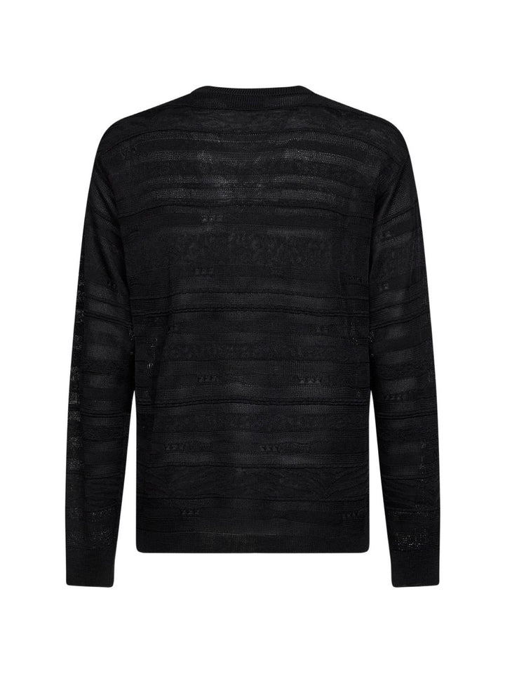 Maglia nera a righe 