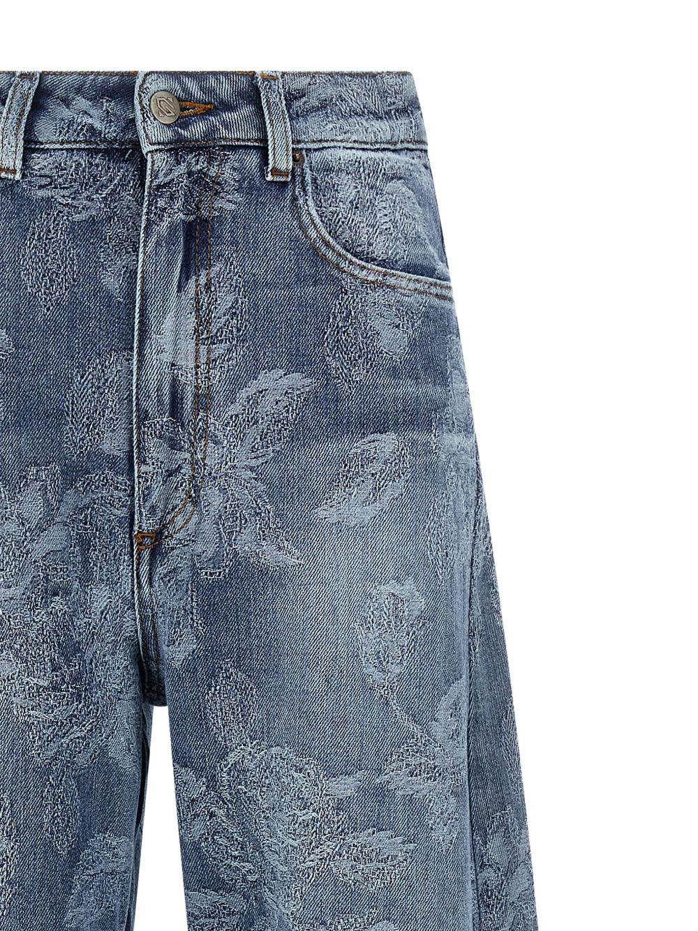 Jeans con ricami floreali 