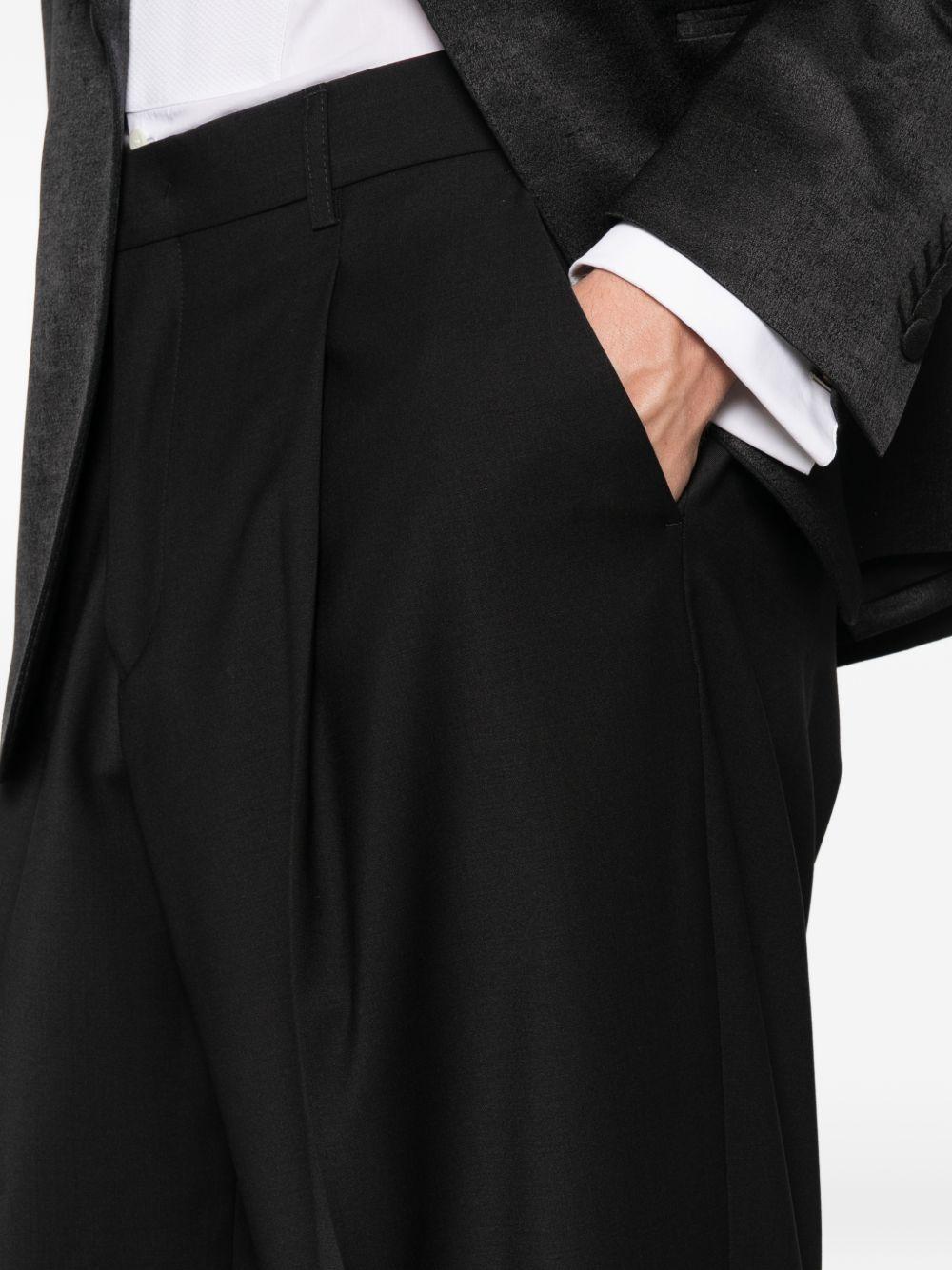 Pantaloni ampi con pinces neri 
