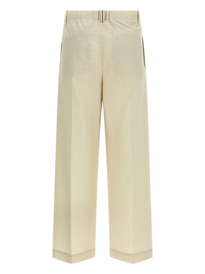Pantaloni con pieghe frontali 