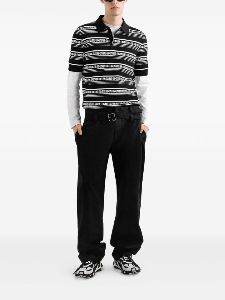Polo nera in seta con logo all-over 