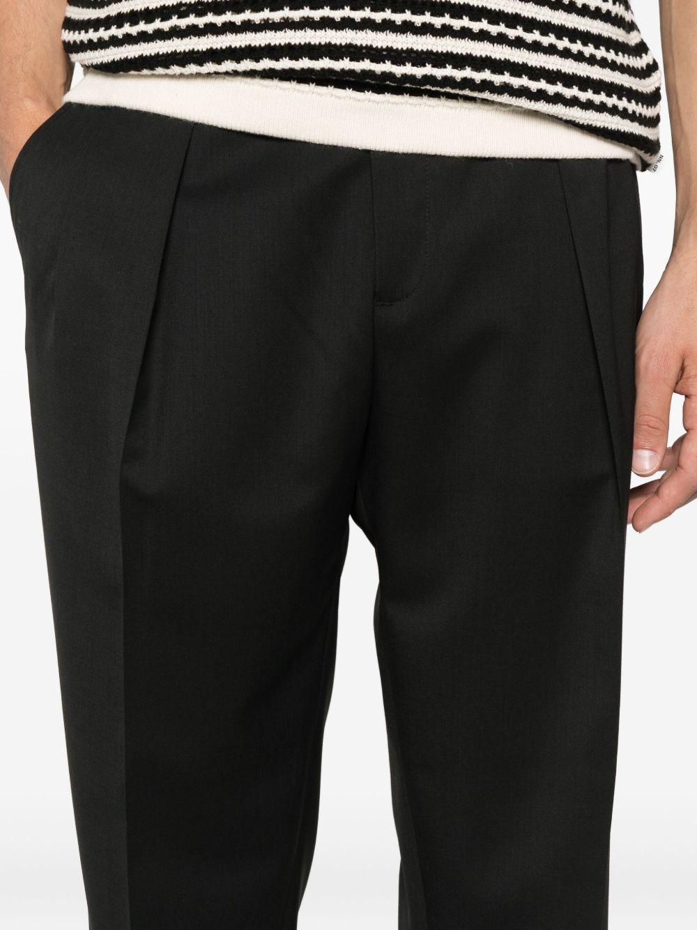 Pantaloni neri con pieghe frontali Portobello 