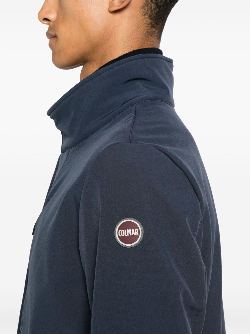 Cappotto blu navy con zip e logo gommato 