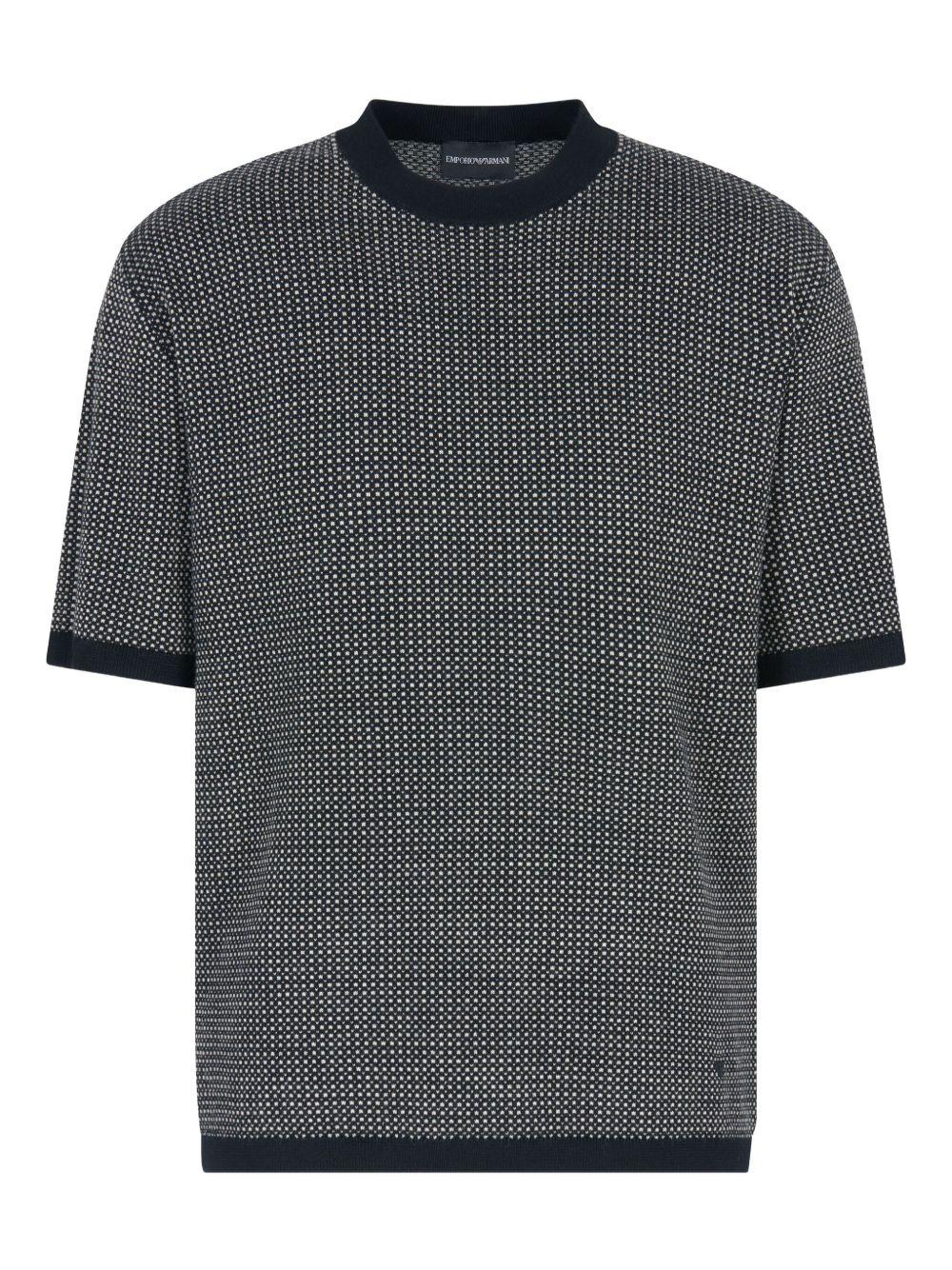 Maglione nero a maniche corte 