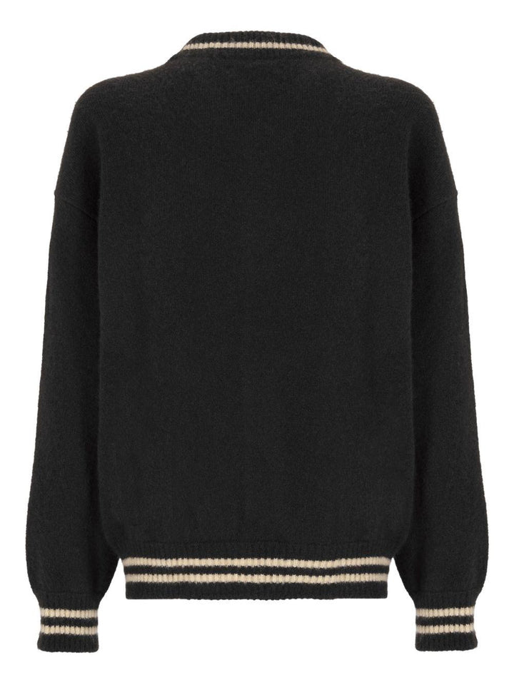 Bomber nero in maglia 