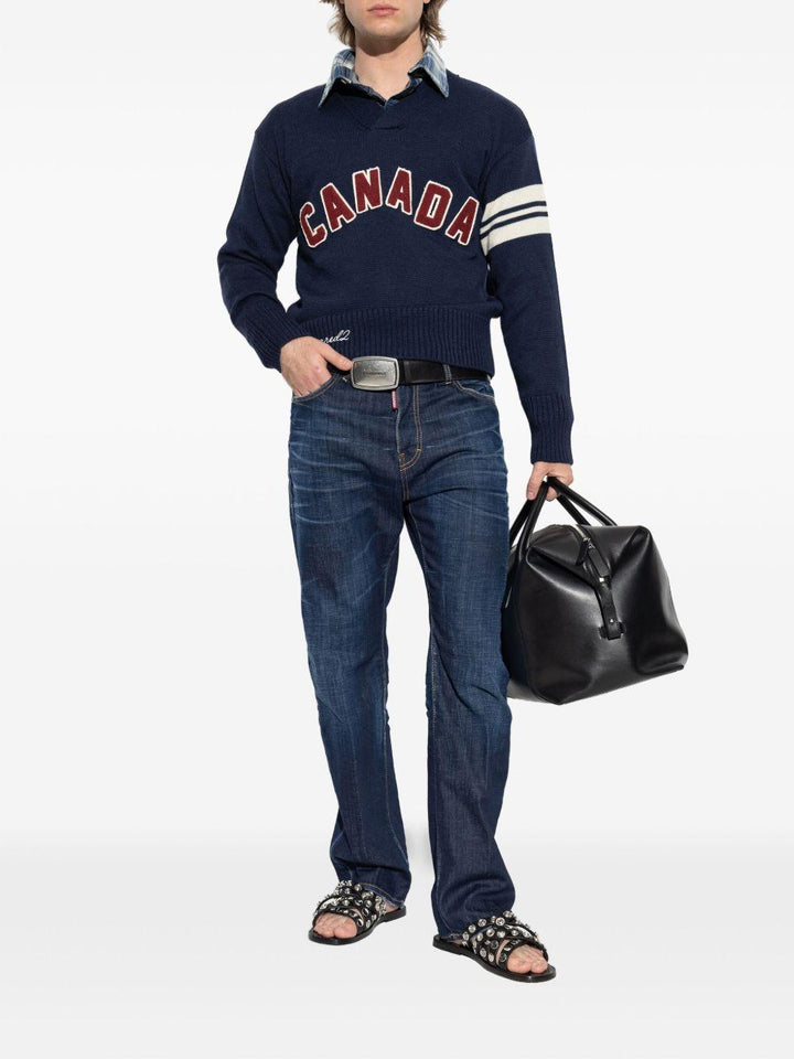 Jeans indaco in cotone con applicazione logo 
