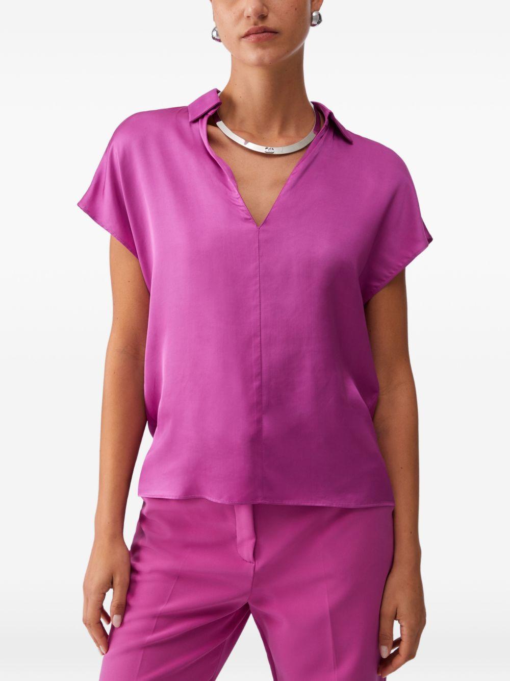 Blusa con scollo a V 