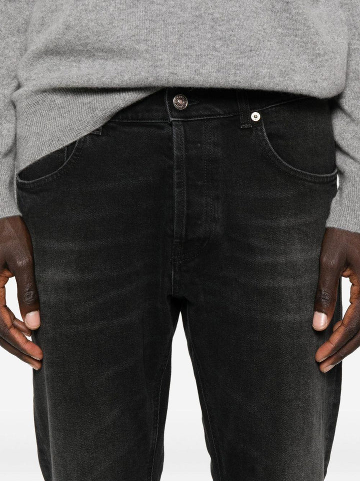 Jeans neri con baffatura 