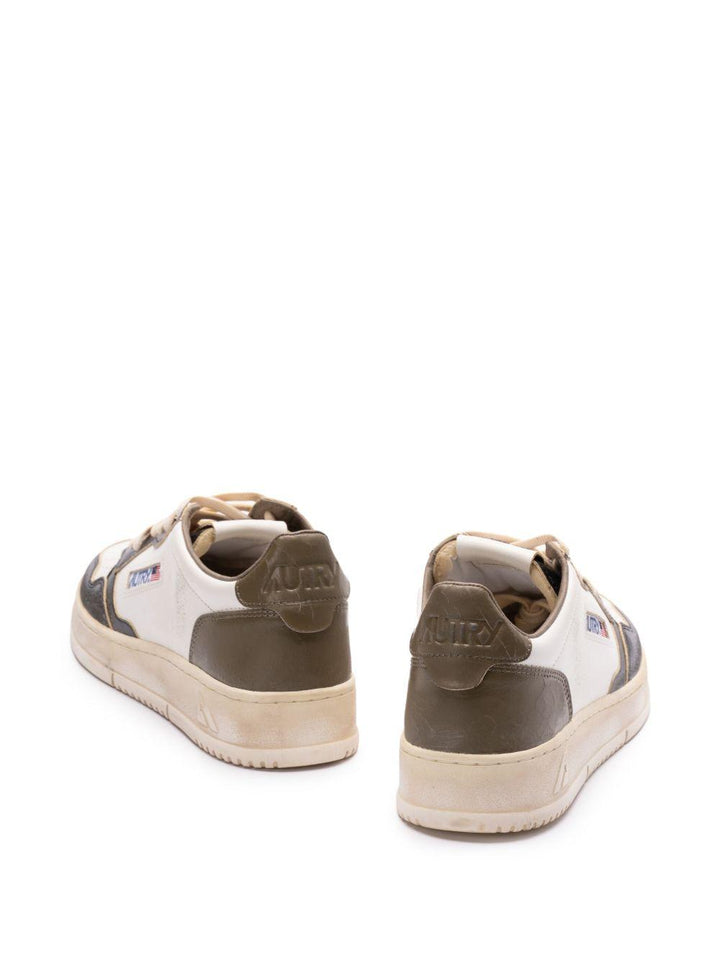 Sneakers bianche bicolore con logo 