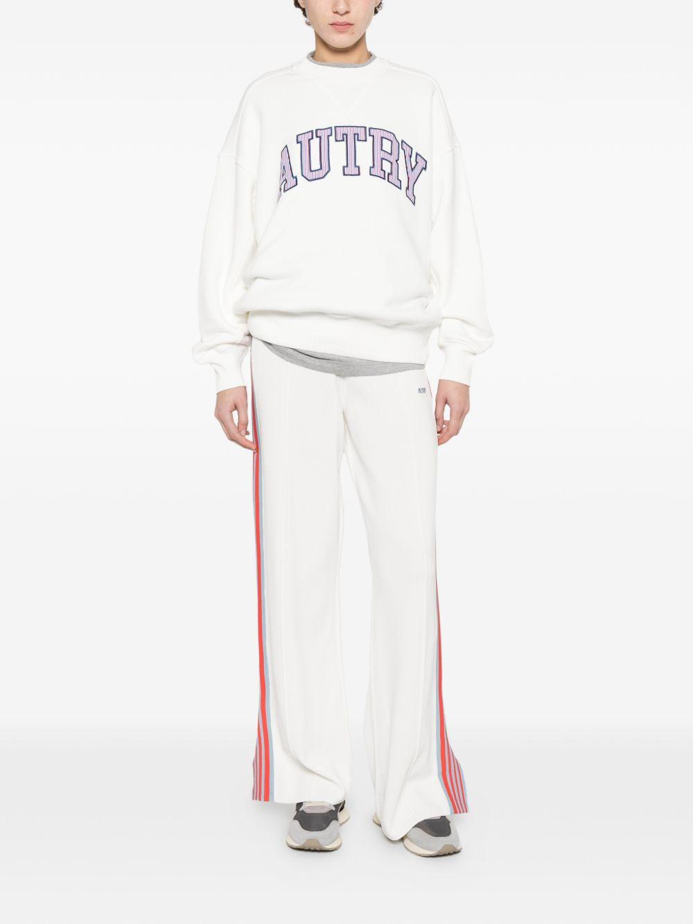 Pantaloni con bande laterali 