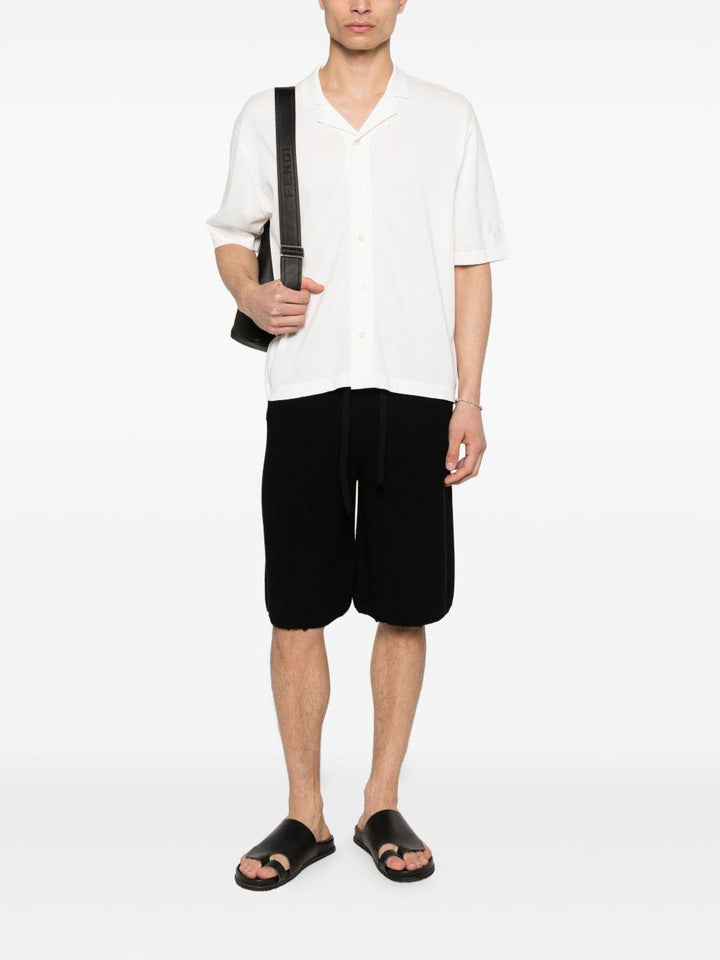 Shorts neroi in maglia con coulisse 