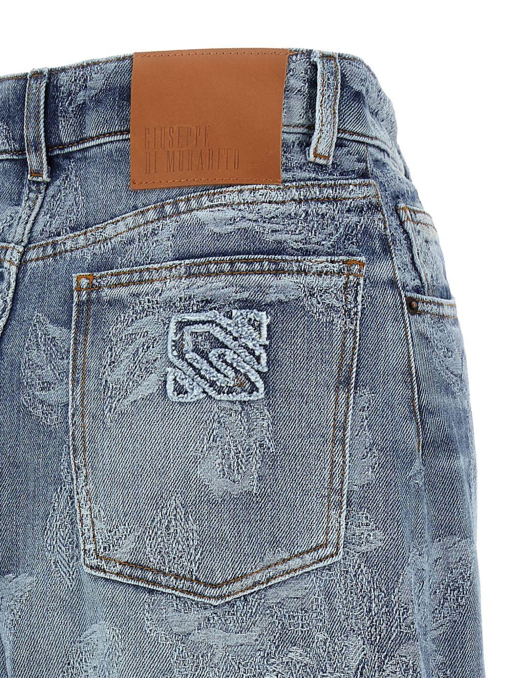 Jeans con ricami floreali 