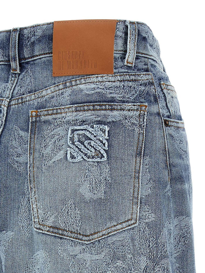 Jeans con ricami floreali 