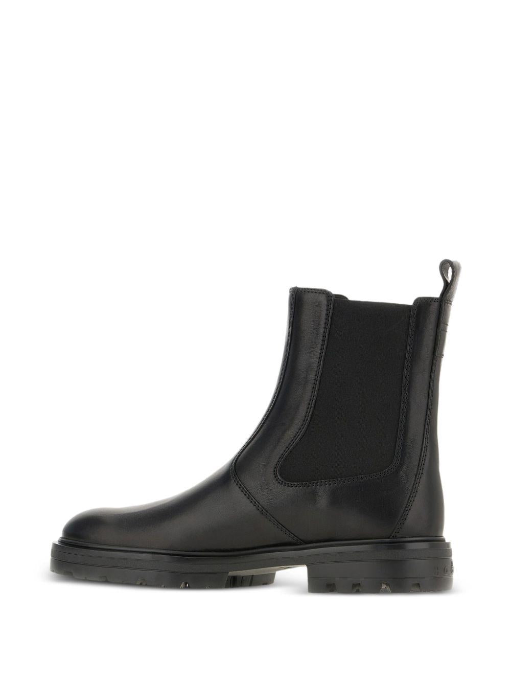 Stivali neri in pelle con inserti elasticizzati 