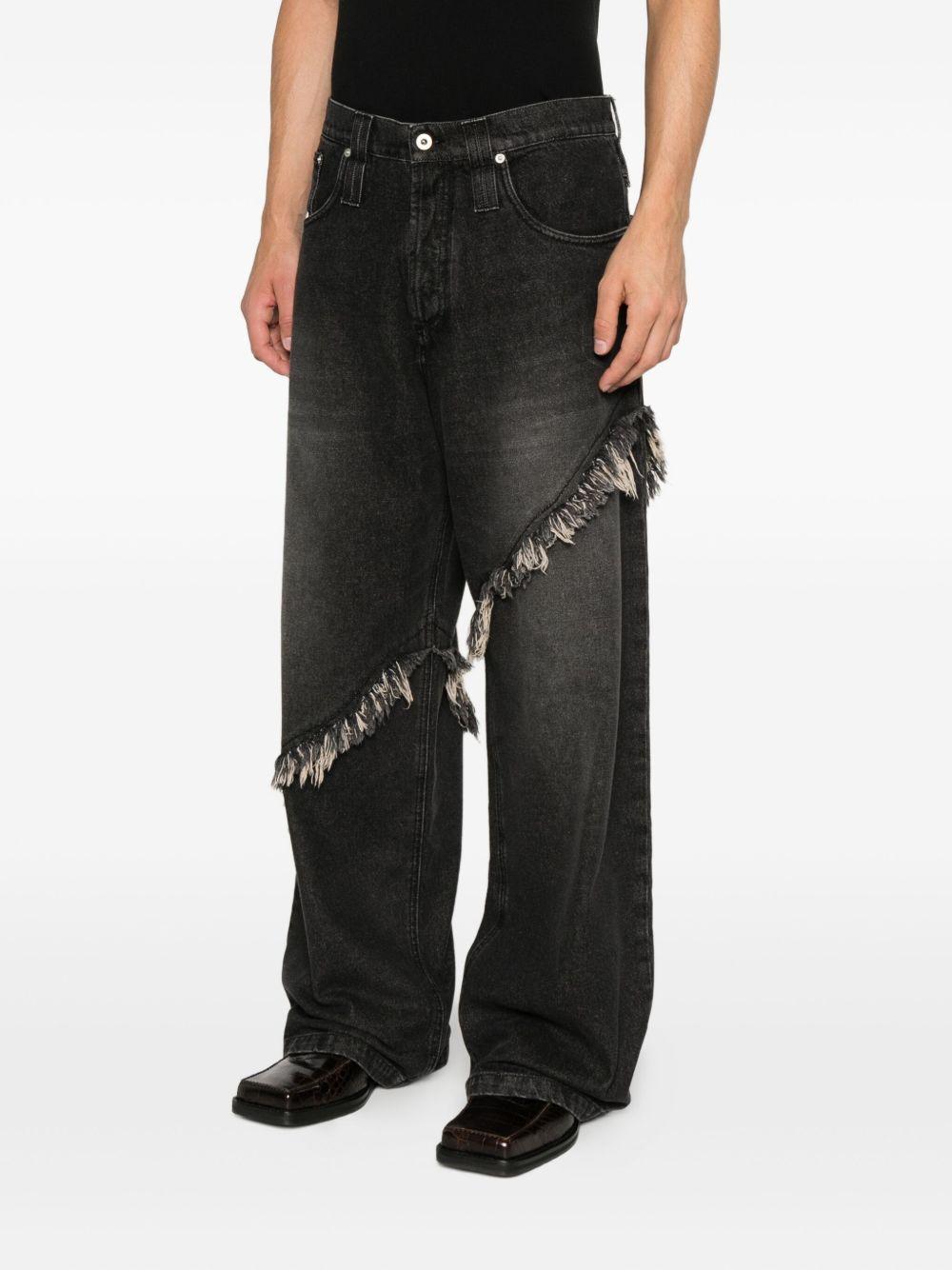 Jeans neri con frange 