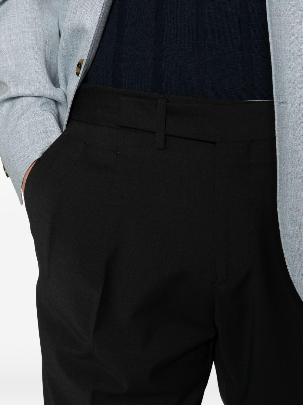 Pantaloni sartoriali blu navi con pieghe 