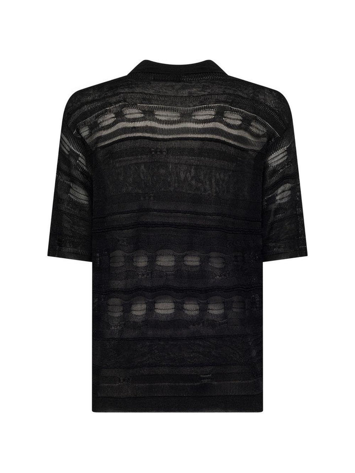 Polo nera in maglia semi trasparente 