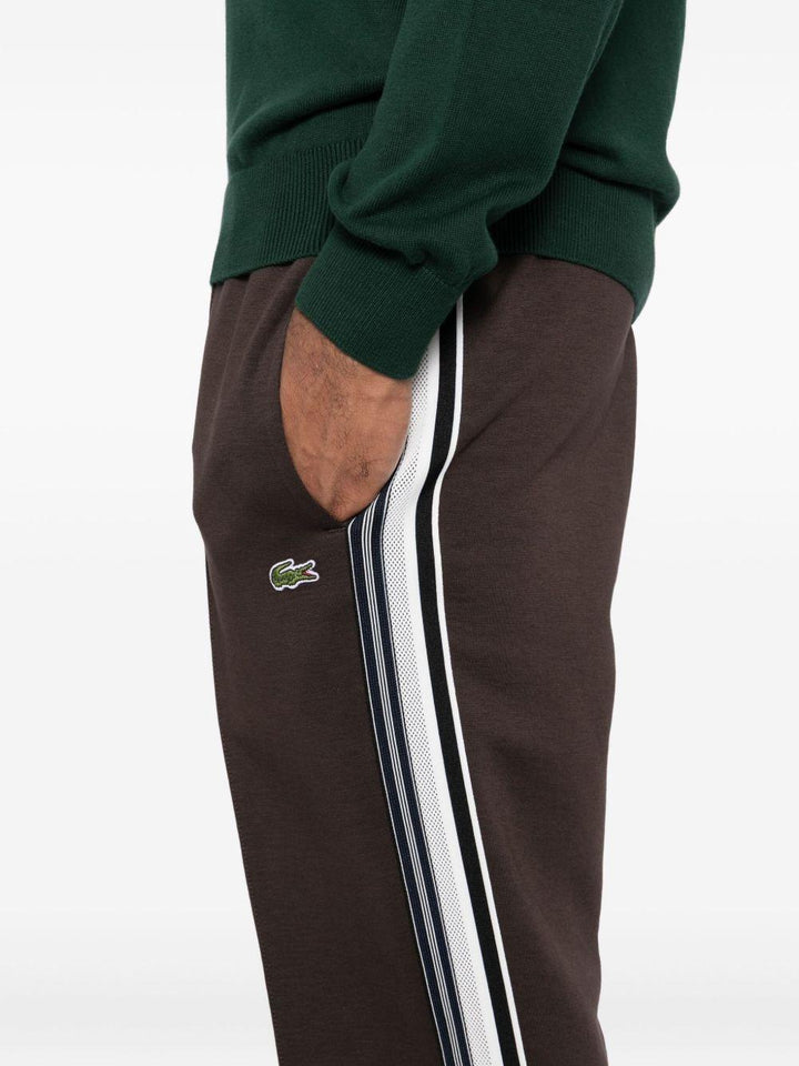 Pantaloni marrone cedro con logo