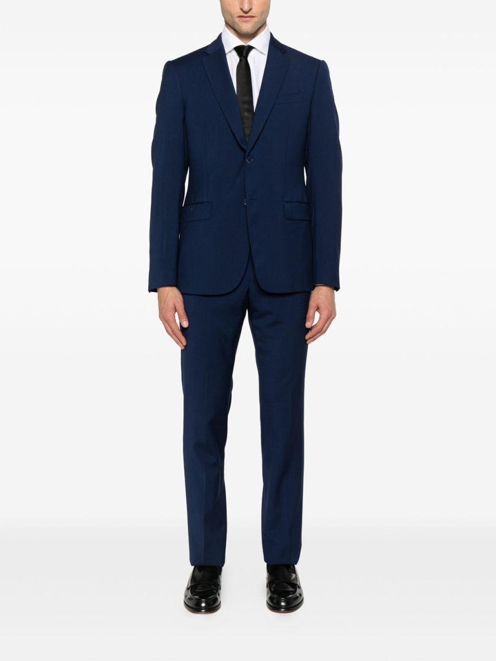 Completo monopetto in lana vergine blu 