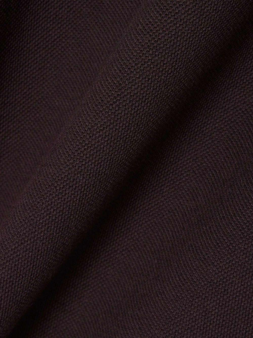 Polo marrone con bottoni 
