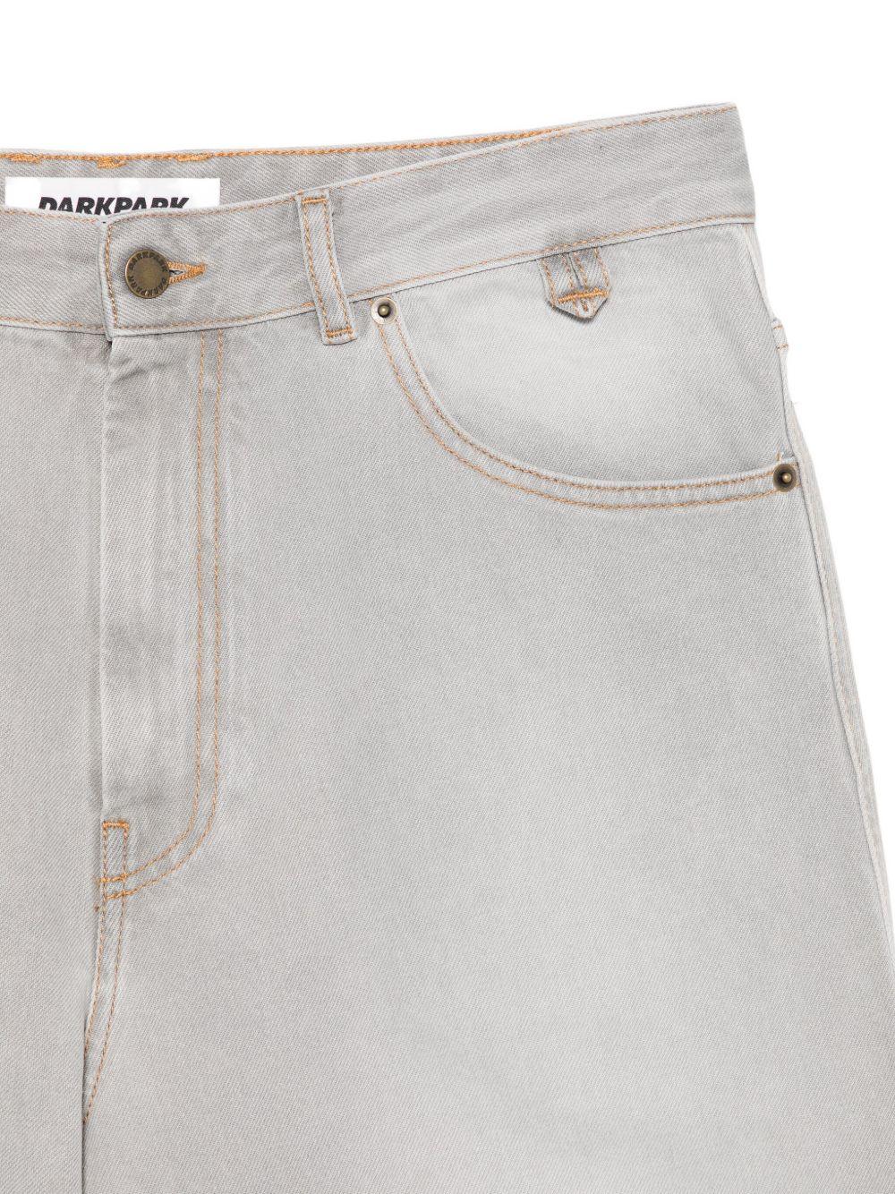 Jeans grigio chiaro con orlo sfrangiato 