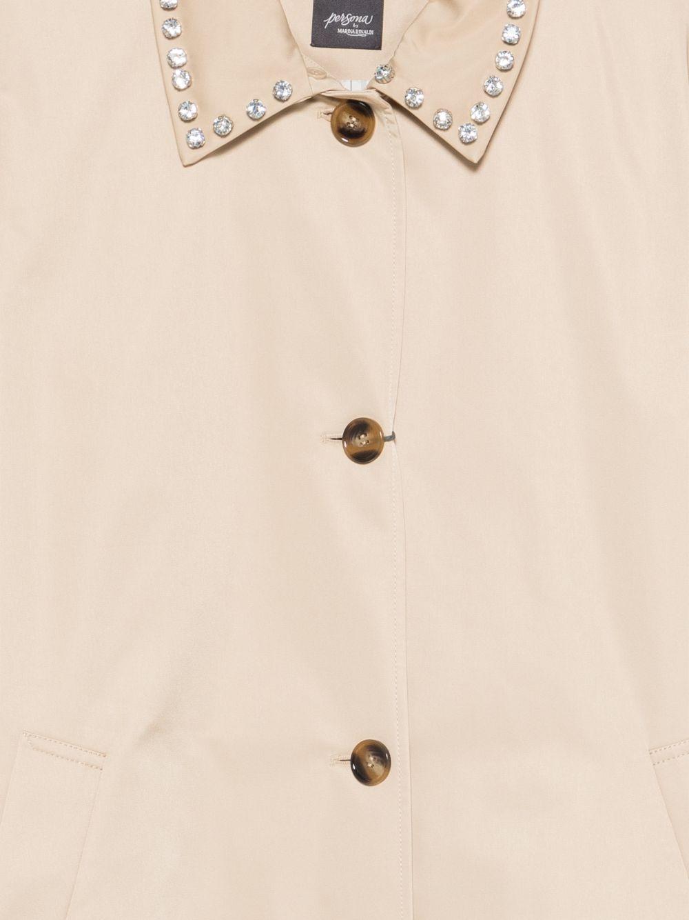 Cappotto in gabardine con decorazioni 