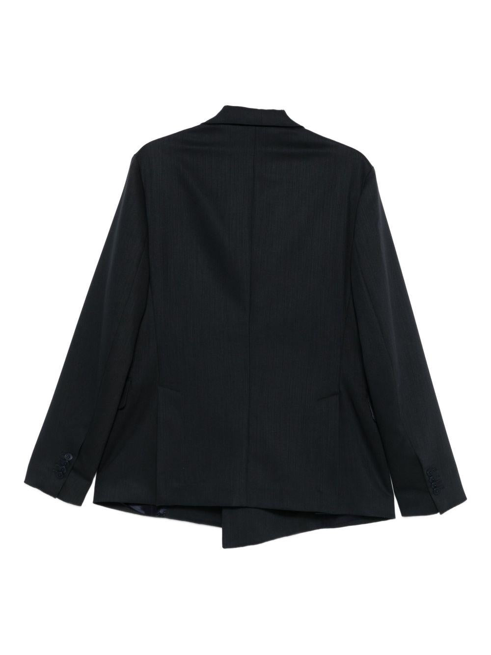 Giacca blu con revers a scialle 