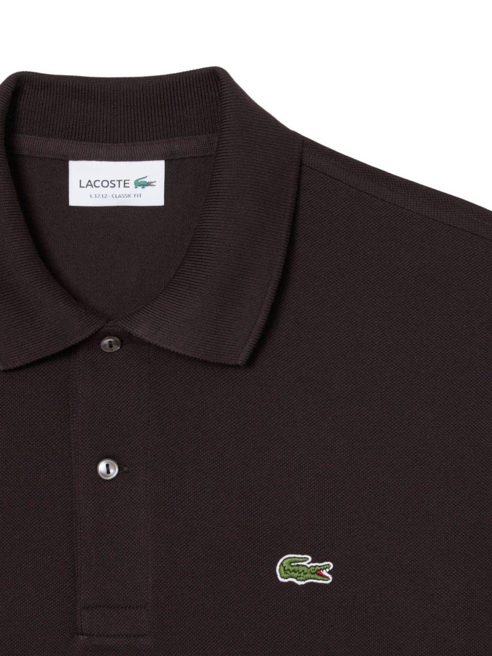 Polo marrone con bottoni 