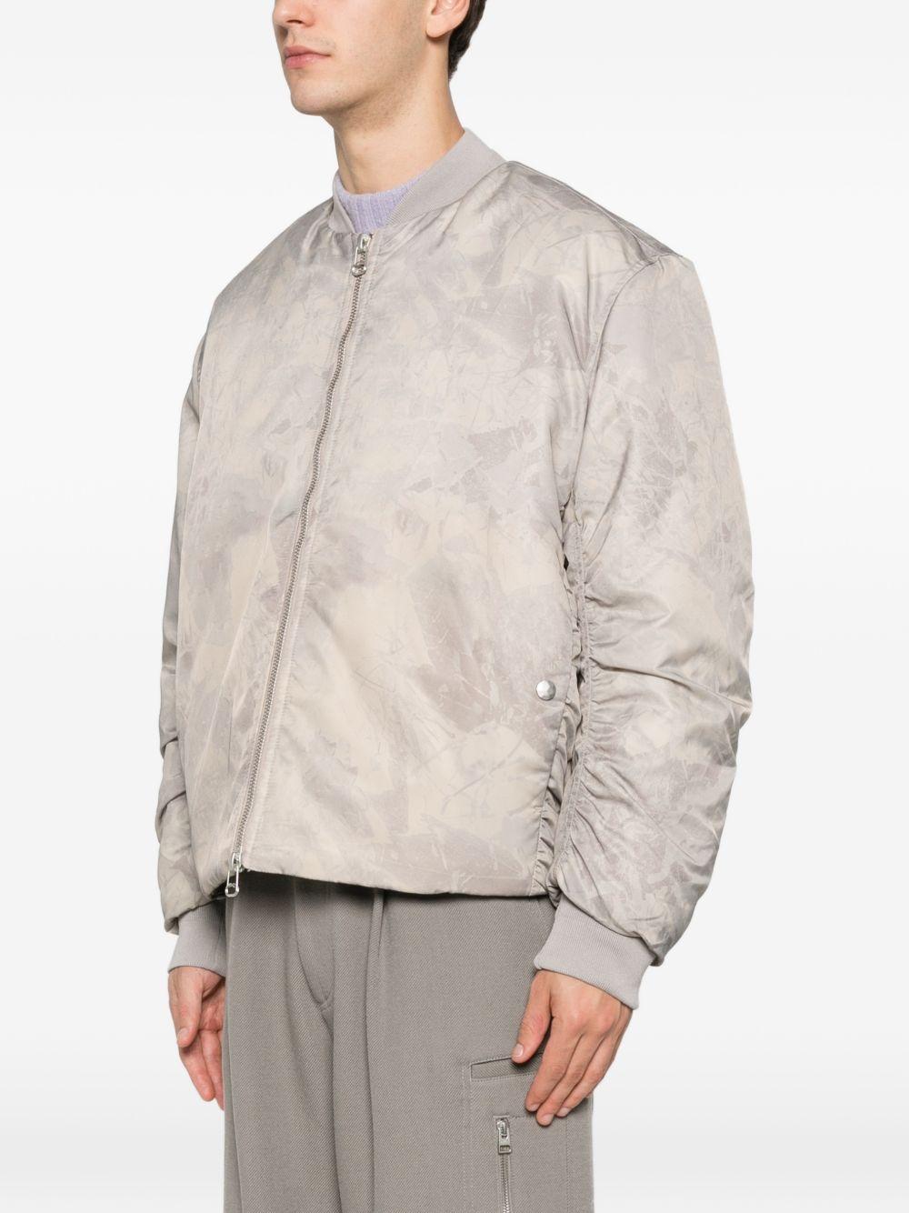 Bomber a colori neutri con zip 