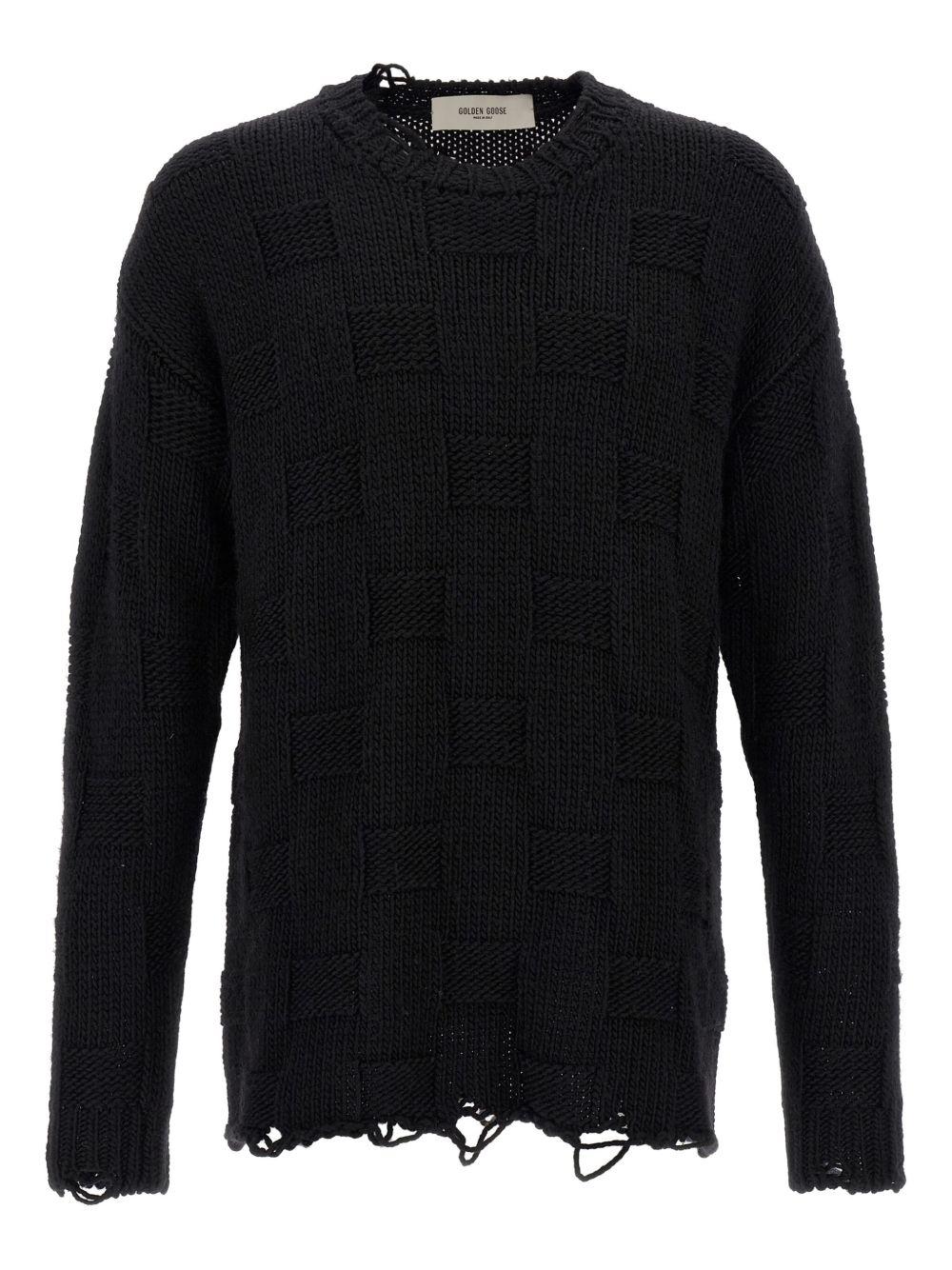 Maglione nero con scollo rotondo e dettagli sfrangiati 