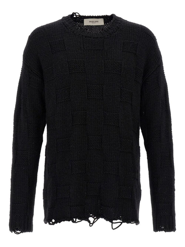 Maglione nero con scollo rotondo e dettagli sfrangiati 