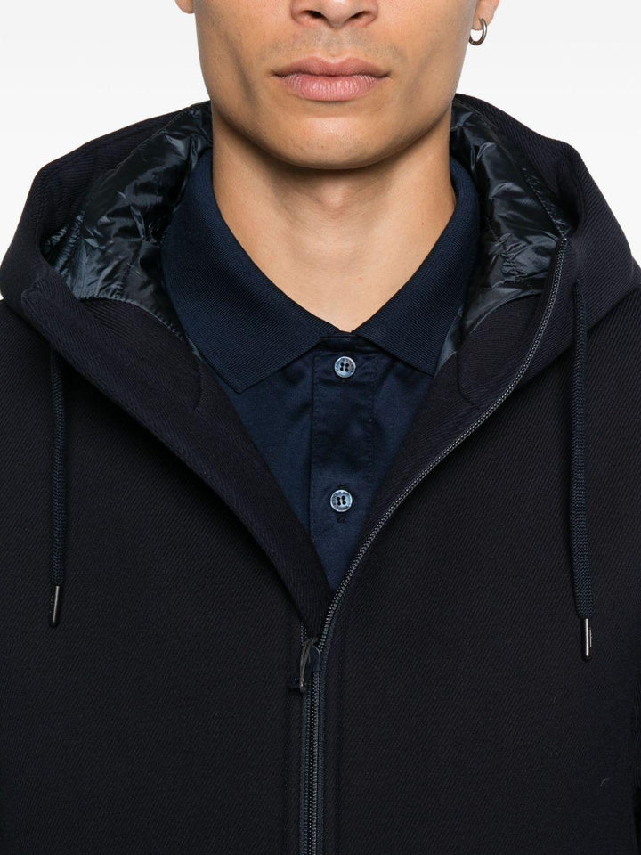 Giaccone navy con zip e cappuccio 
