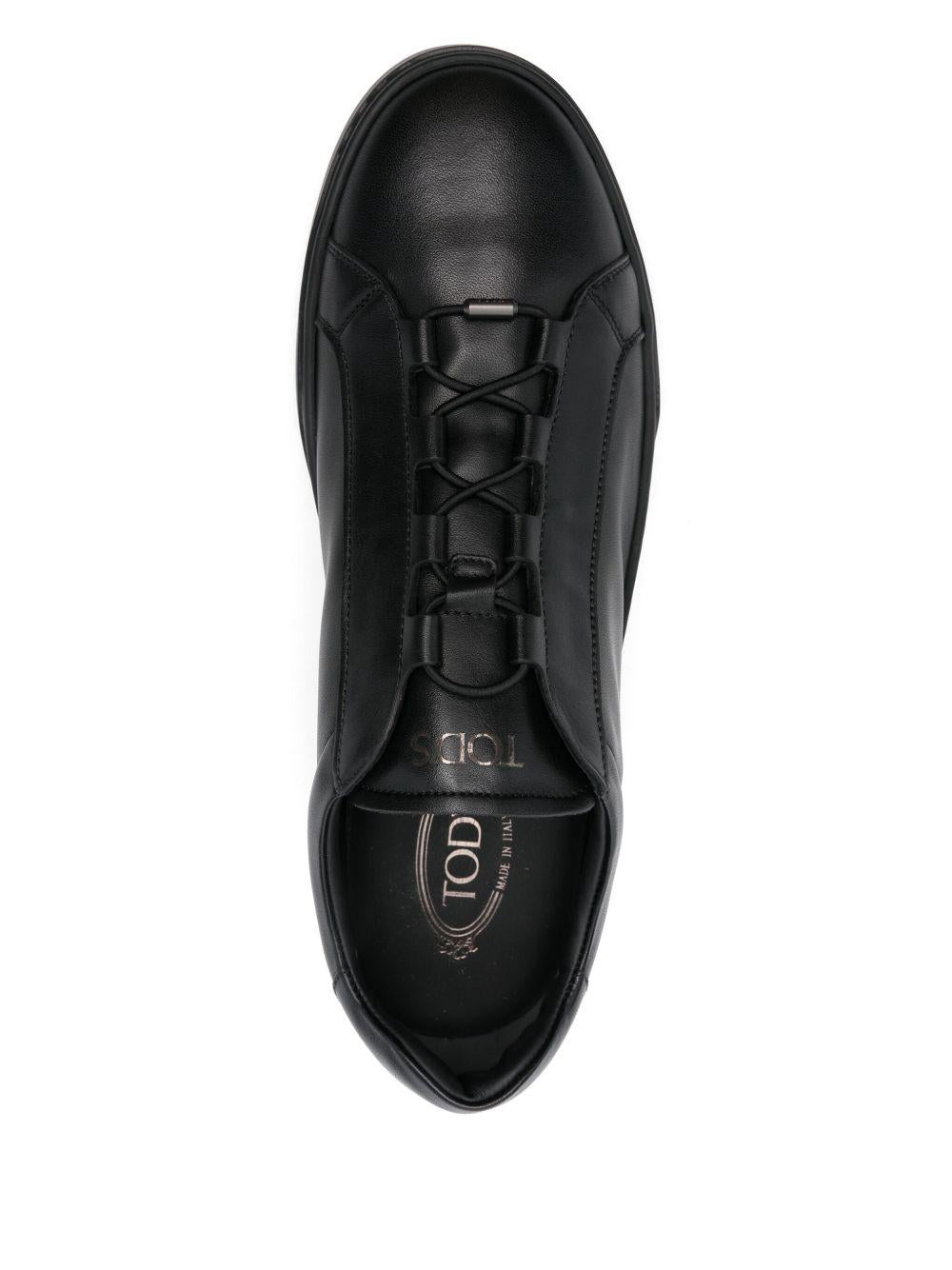 Sneakers nere in pelle con fascia elasticizzata 