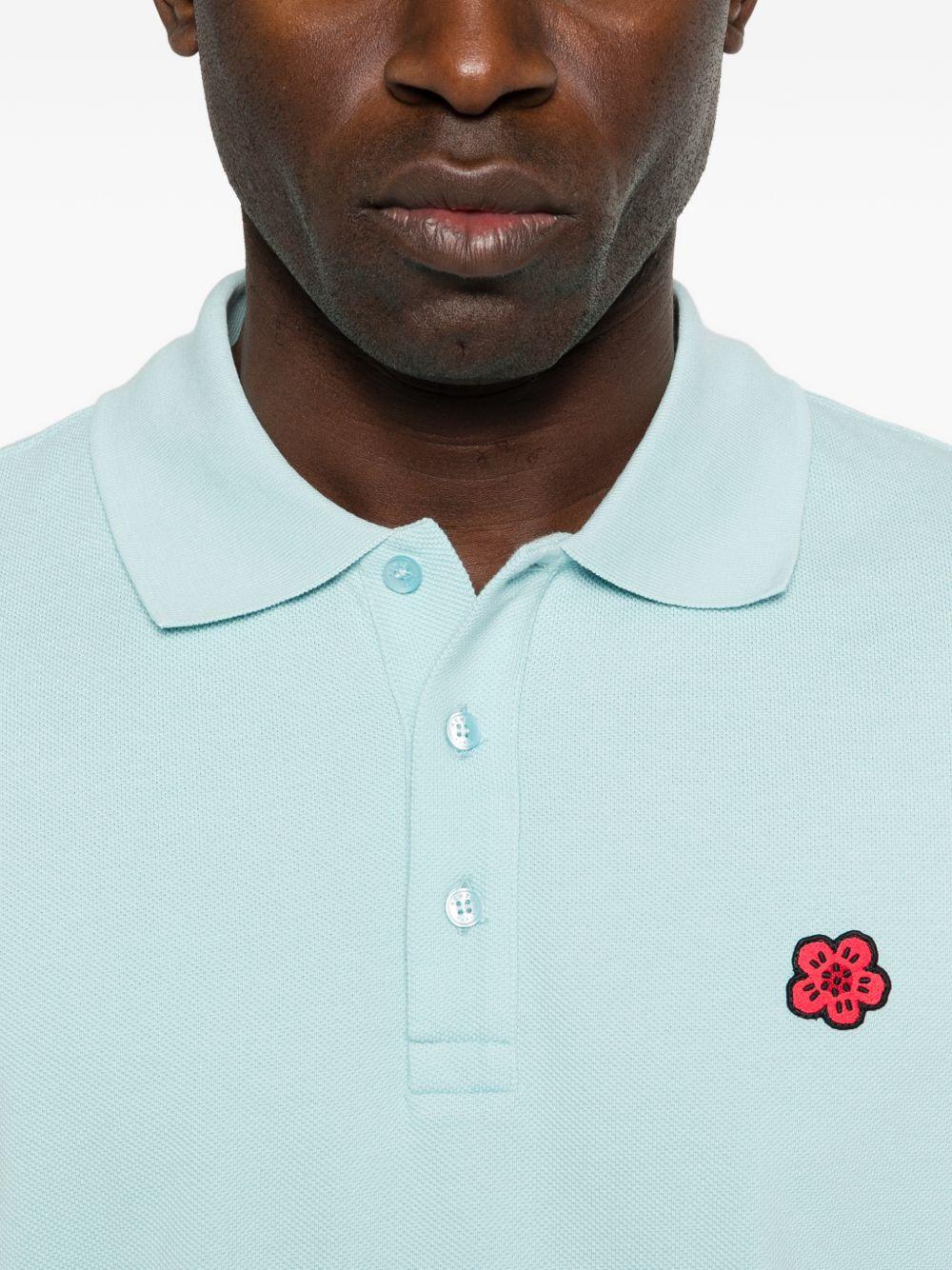 Polo con patch floreale glace 