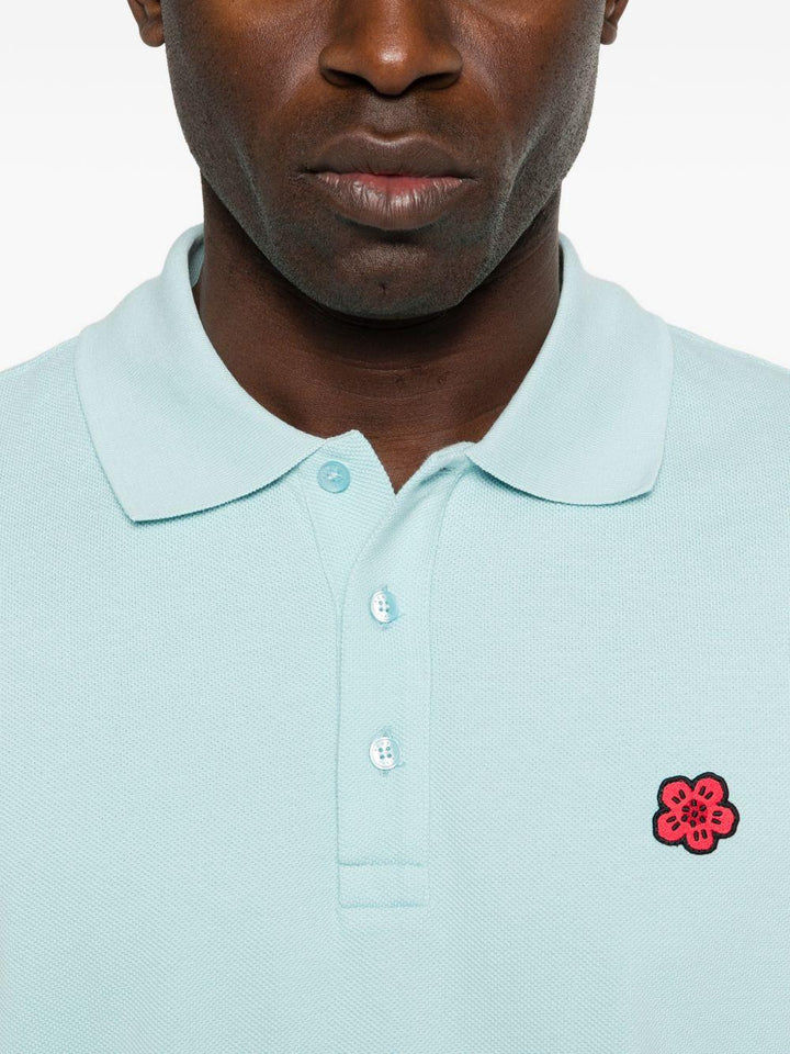 Polo con patch floreale glace 